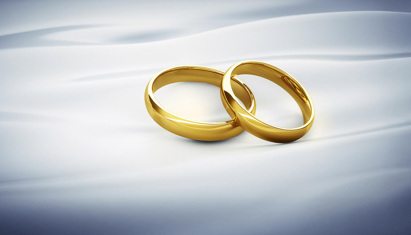 Gold wedding bands symbolizing how prenuptial agreements can serve as powerful estate planning tools to protect assets and support long-term financial goals.